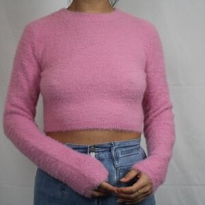pink fuzzy sweater